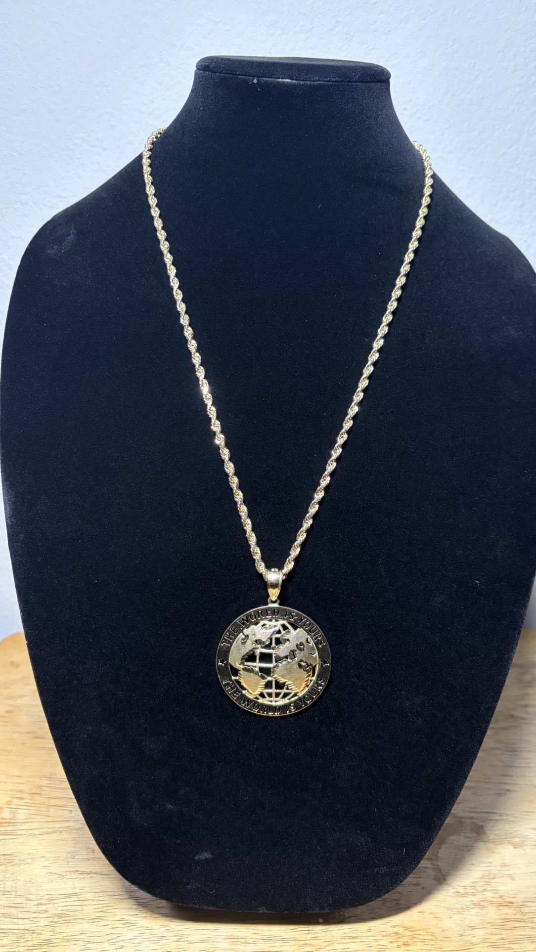 Rope chain with gold pendant