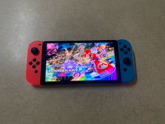 NINTENDO SWITCH OLED MODEL Loaded with 100 POPULAR SWITCH GAMES and 512GB SD