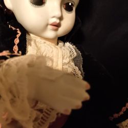 Wind Up Musical Porcelain Doll 
