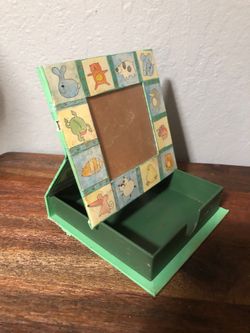 Decorative box with picture frame on the top