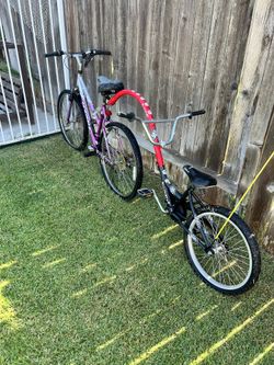 Bike With Tagalong Rider 