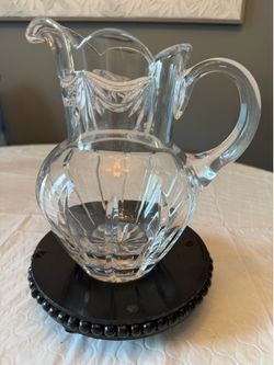 Beautifully faceted glass pitcher
