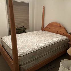 Wooden four post bed