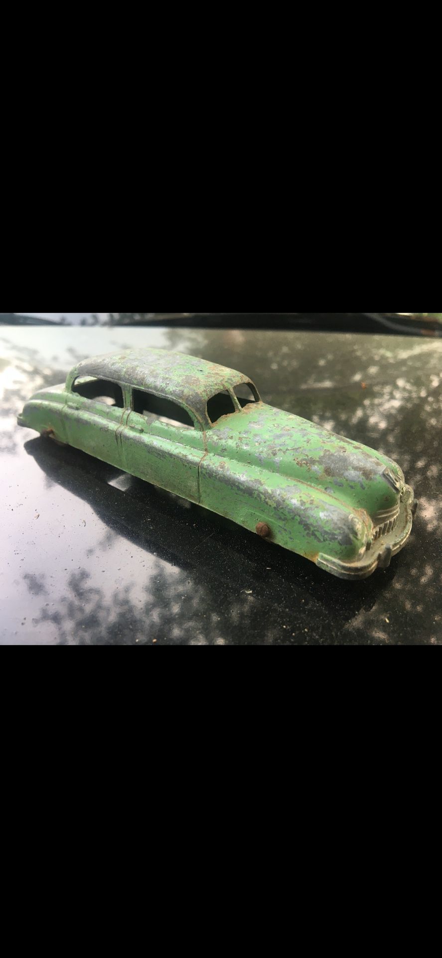 1930’s-1940’s metal toy car, 6” long, stamped USA under roof.  $20