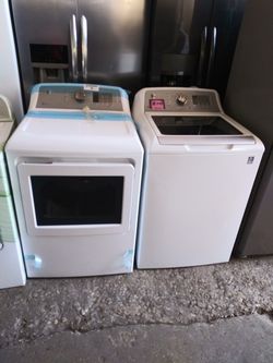 NEW scratch and dent GE top load washer and dryer set