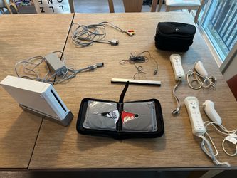 Nintendo Wii Bundle – 2 Controllers + Games + All Cables – Ready to Play