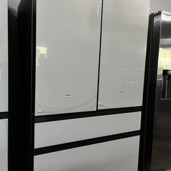 Bespoke 36 in. 29 cu. ft. Standard Depth 4-Door French Door Refrigerator with Sphere Ice in White Panels.
