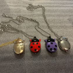 NEW LADYBUG QUARTZ NECKLACE WATCHES - $12 each
