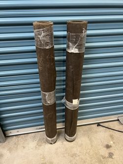 Two Rolls Of Roofing Paper