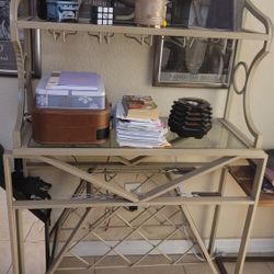 Cute little entry table, coffee bar, or wine bottle holder.