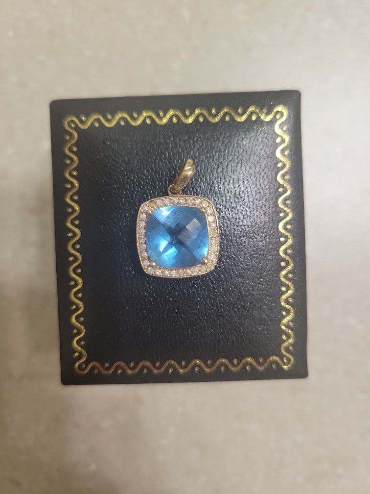 Maui Divers 14 K Gold Blue Topaz And Diamonds Pendant. Weight Is 3.2 Grams