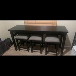 4Pc Black Sofa Table and Cushioned Stools