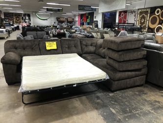 Brand new Ashley sofa sleeper $985