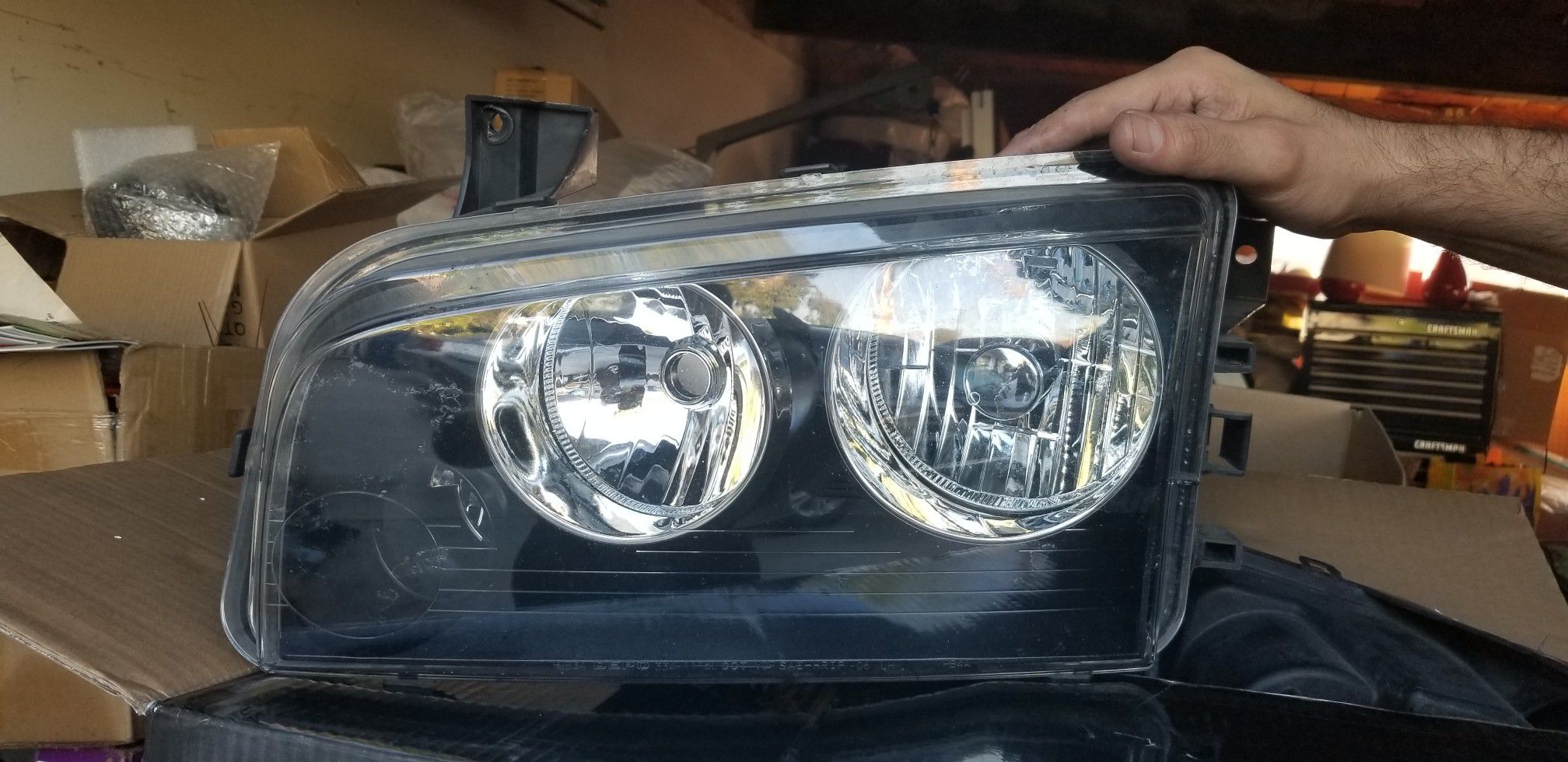 Driver side headlight 2008 Dodge Charger