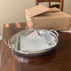 Plancha Redonda De 30.5 Cm En Acero Inoxidable Con Tapa De Cristal