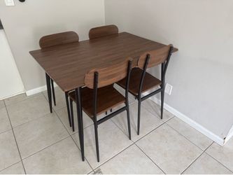 Wood and black metal dining room table set