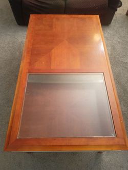 Coffee table with glass top