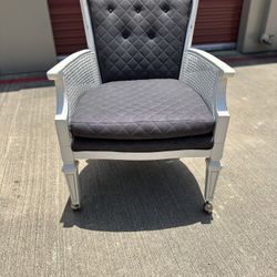 Cute Upholstered Vintage Rolling Chair With Padded Seat & Cane Side