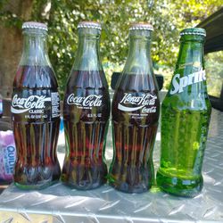 Antique Coke Bottles Full