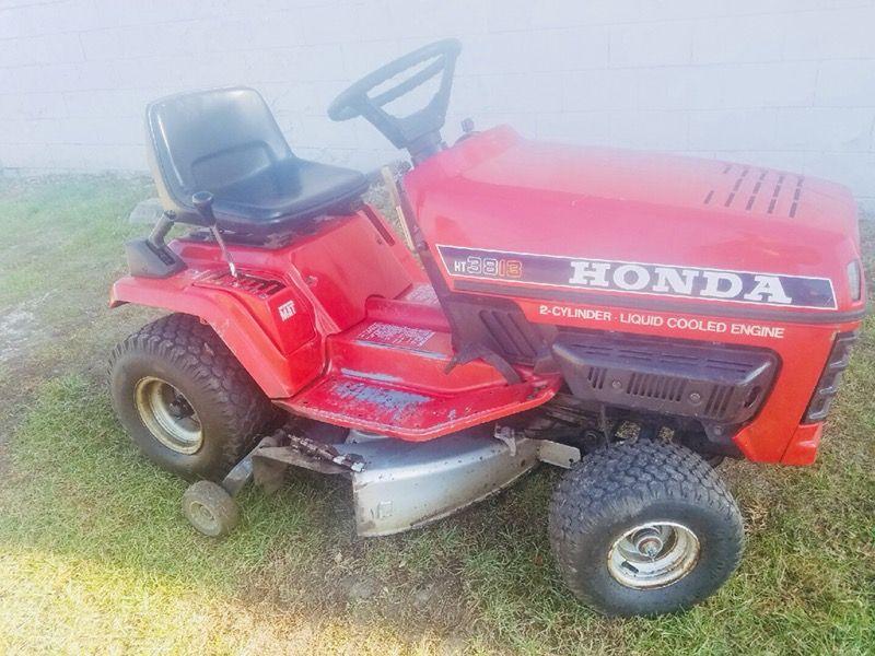 Honda ht3813 tractor riding mower.
