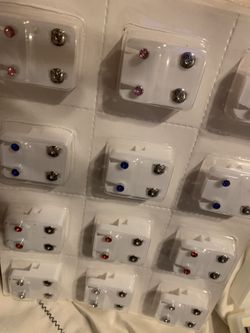Earrings With Ear Piercer Brand New