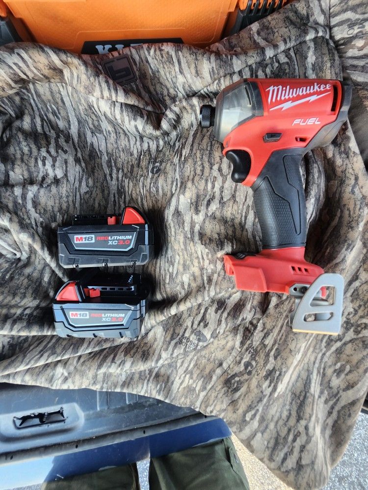 New Milwaukee M18 FUEL Surge 1/4" Impact With 2 New 3 AH Batterys