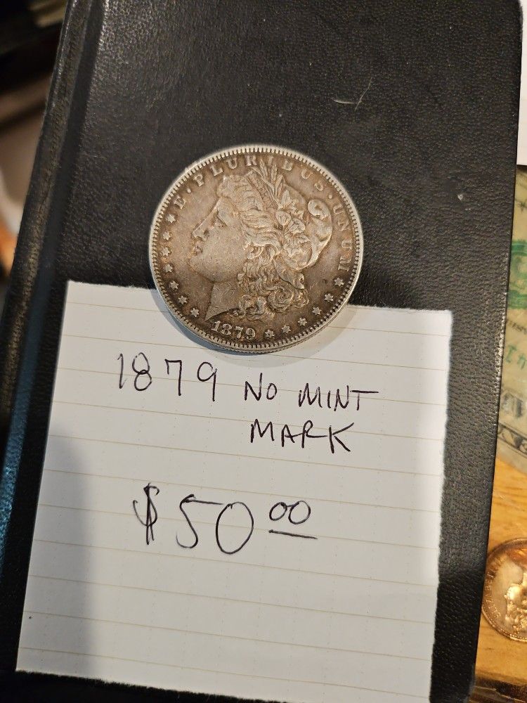1879 No Mint Mark Morgan Silver Dollar