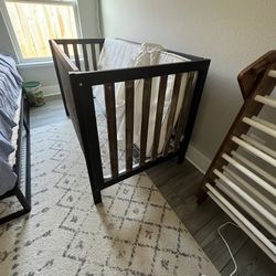Baby Crib— Black and Stained Wood