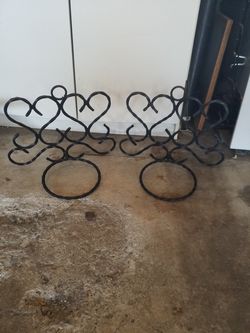 Wrought iron plant holders
