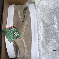 Beige Vans 