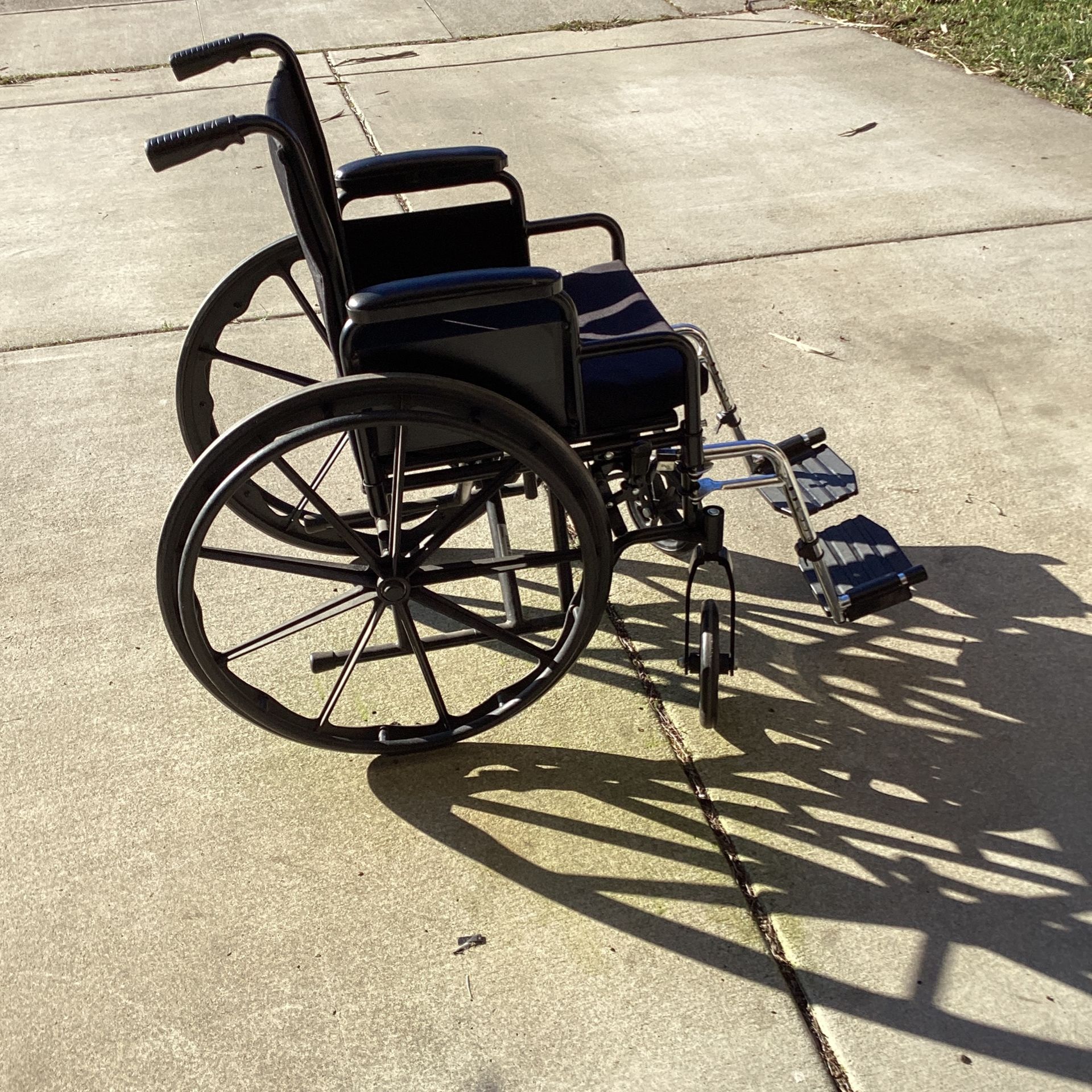 Wheelchair excellent condition very light easy to carry and fold almost new