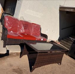 BRAND NEW ASSAMBLED FROM THE BOX PATIO SOFA