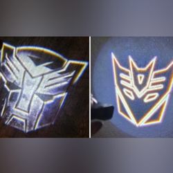 2 wireless Universal Fit Transformers Decepticon OR Autobot logo Car Door Lights All other items seen sold separately SHIPPING AVAILABLE