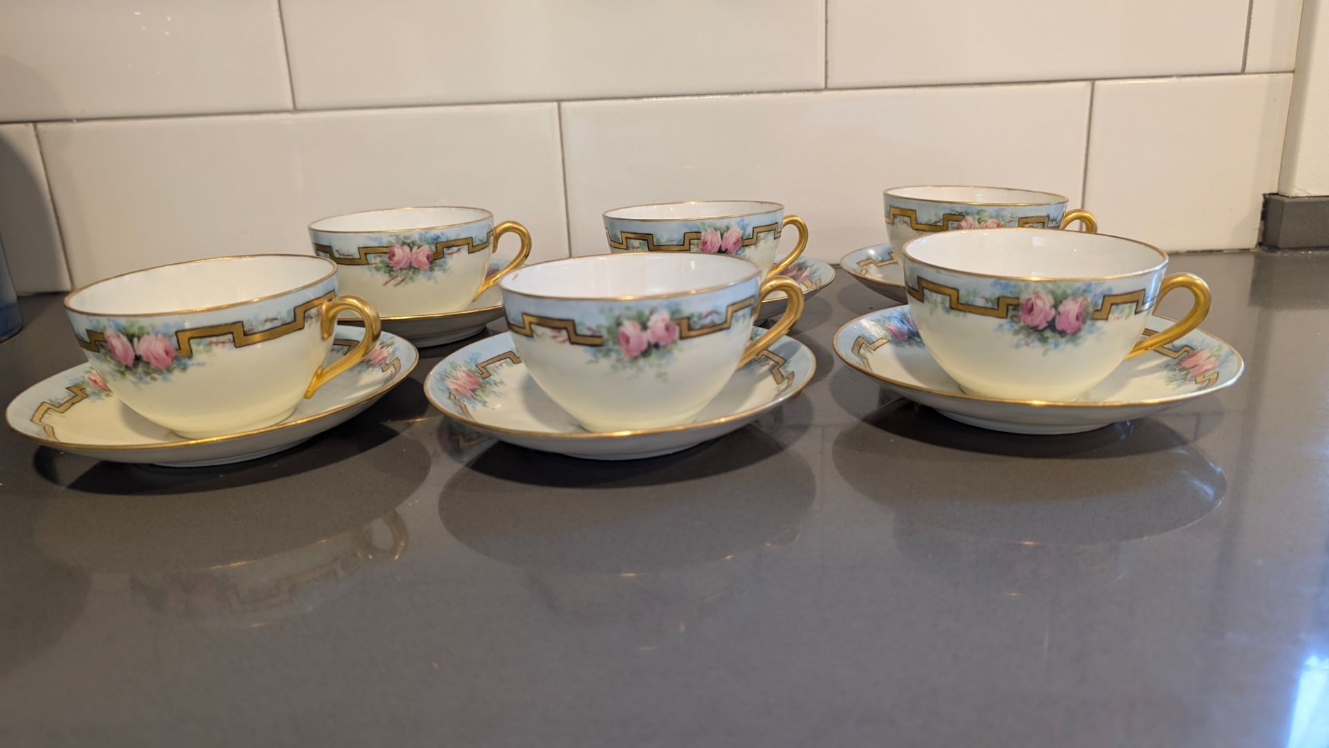 Hand painted gold tea cup set