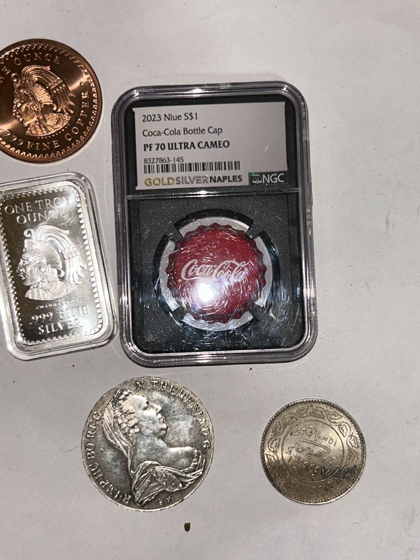 2023 graded PF 70 ultra Camillo, Coca-Cola bottle, cap, one toy ounce Aztec and other silver