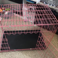 large pink dog crate