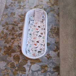 Snuggle Nest Portable Infant Bassinet And New Blanket