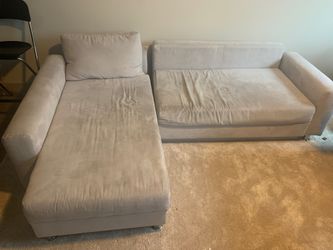 Couch (turns into sleeper sofa and has storage”