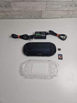 Sony PS Vita PCH-2001 Black Handheld Console 
With 1 Game