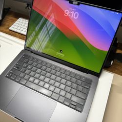 MacBook Pro 14-inch with Apple M3 Pro chip (Late 2023) in excellent condition.