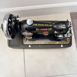 Vintage Sewing Machine with hand crank