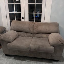 grey/tan couches good condition comes with full table set 