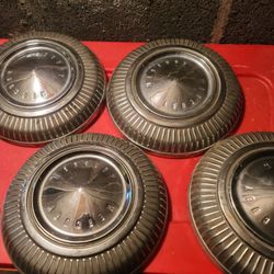 4  Mercury hub caps