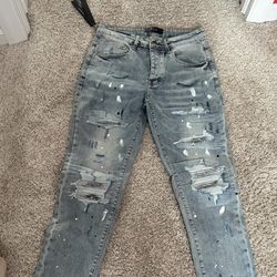 Amiri jeans white patches