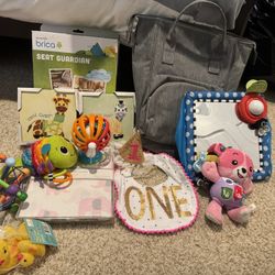 Assorted Baby And 1 Year Old Toys And Babiators