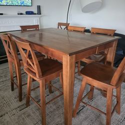 Solid Wood Table And 7 Chairs