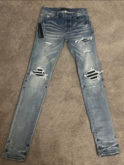 Amiri MX1 Distressed Skinny Jeans