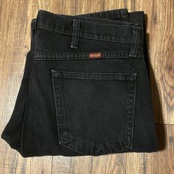 Black Wrangler Rustler Jeans