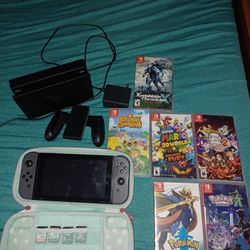 Nintendo Switch W/ case , sd card and games 