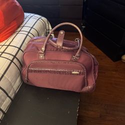 Samsonite carry on with wheels. Luggage